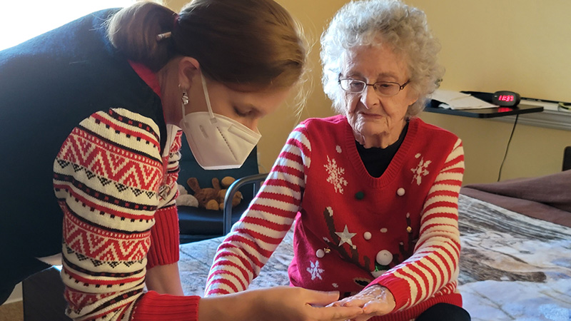 Staff member assisting resident